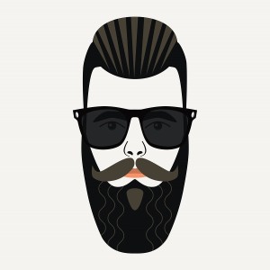 Cool beard hipster male with gelled back highlighted hair and black lenses sunglasses